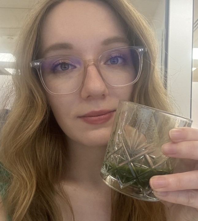 Courtney Pochin, holding a glass of Punishment Juice from M&S