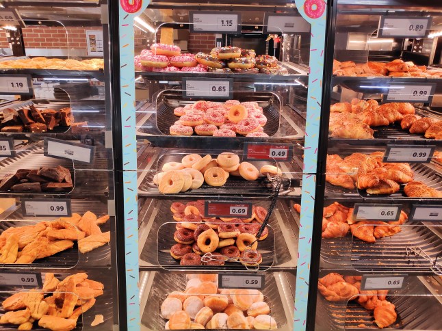 Freshly baked goods in the bakery section at a Lidl supermarket.