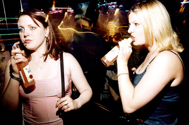 Two girls drinking Barcardi Breezers