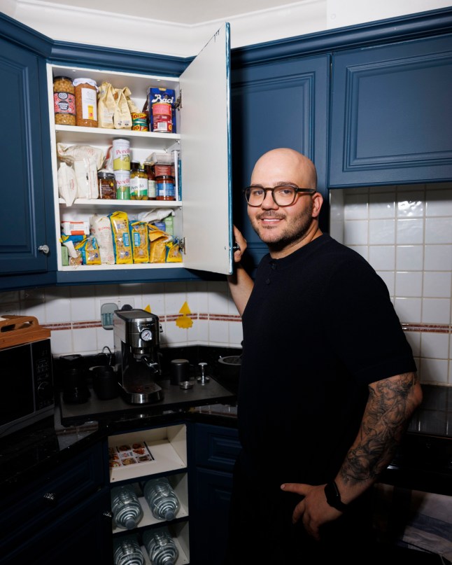 Michele Pascarella in his kitchen. Pictured: The cupboard. (C) Belinda Jiao 07598931257 jiao.bilin@gmail.com