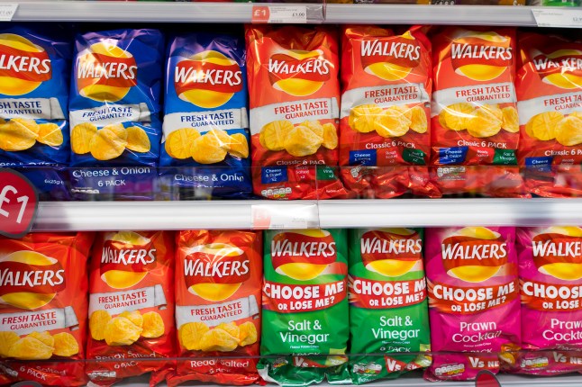 Walkers crisp packets on supermarket shelves