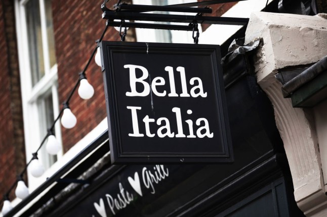 The signage for a Bella Italia restaurant