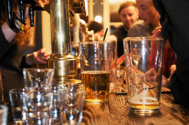 riotous drinking party in public bar