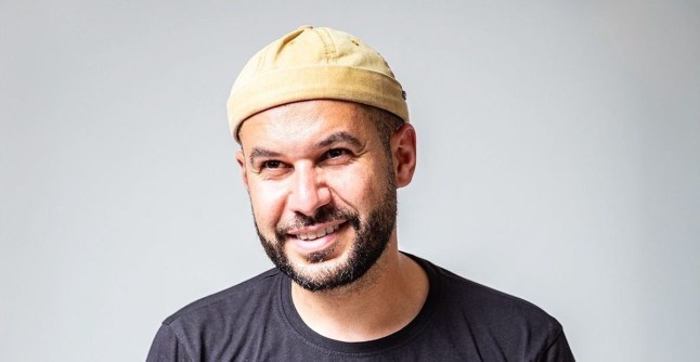 Amro Tabari smiles towards camera