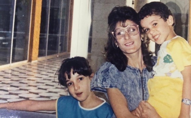 Amro Tabari as a child with his mother and sister