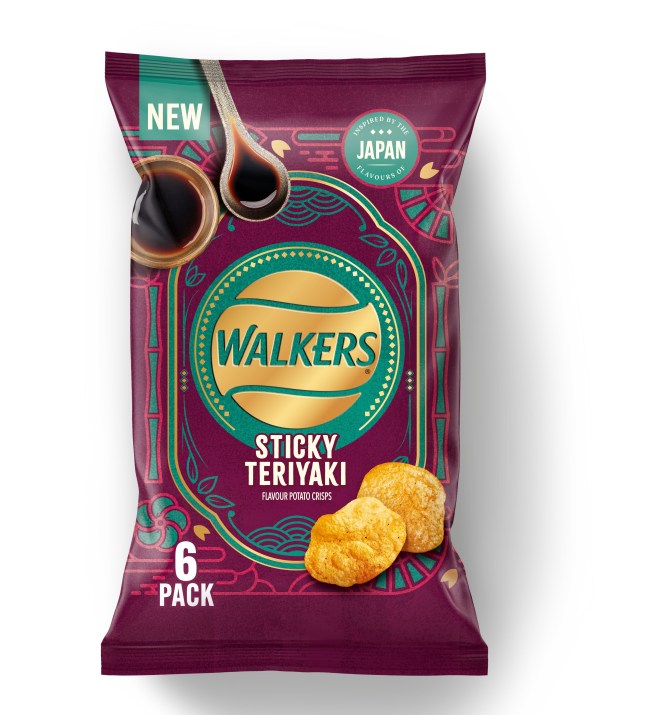 Pack of new Walkers Sticky Teriyaki crisps on a white background