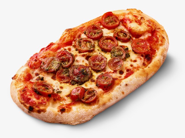 Mozzarella and pesto pizza from Lidl on a white background
